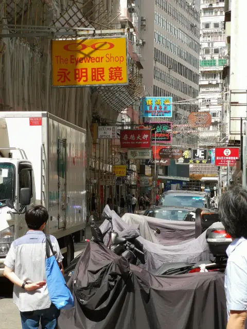Street bustle and signs on Kimberley Road